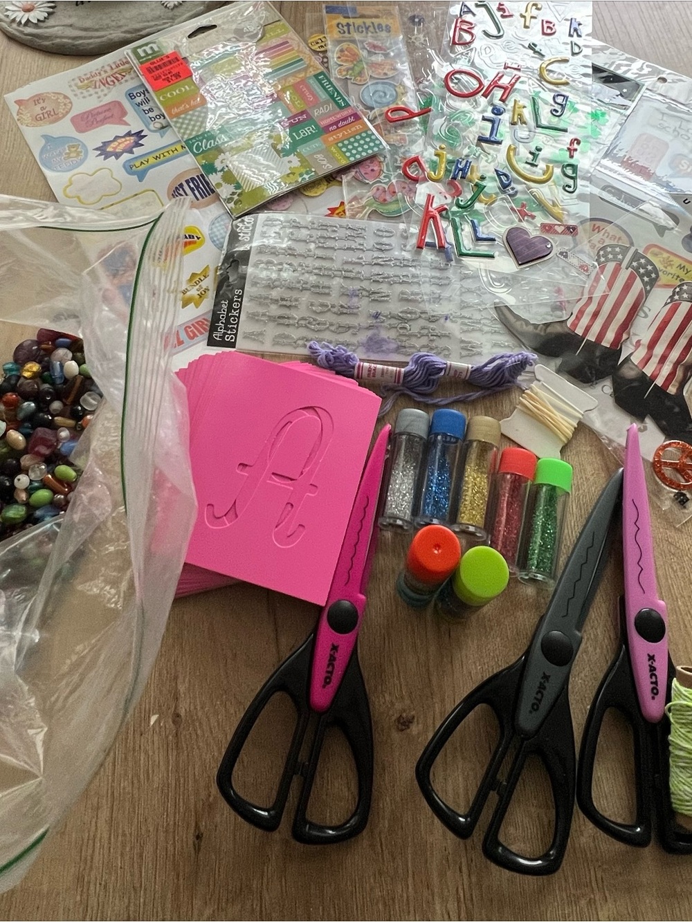 Scrap book materials - sparkles, stickers, scissors and more!